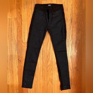 Studded skinny jeans.